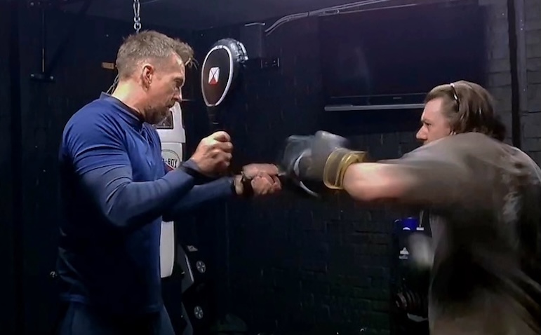 One-on-one boxing pad work session with personal trainer at Boxing Fitness MK